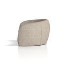 Dynamic Phoebe curved sofa with plush fabric and modern design, shown in a cozy living room setting.