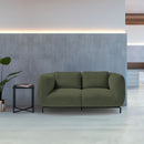 Dams Ebony Single Sofa Chair with dark wood legs, upholstered in black fabric, shown in a living room setting.