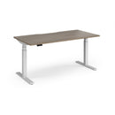 Dams Elev8 Luxe Straight Sit-Stand Desk 1600mm with white tabletop and adjustable height in a modern workspace setting.
