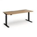 Dams Elev8 Luxe straight sit-stand desk in 1800mm with black frame and wooden surface, showing adjustable height and modern design.