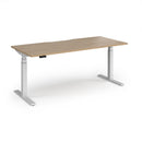 Dams Elev8 Luxe straight sit-stand desk in white, 1800mm length, showing adjustable height mechanism and sleek modern design.