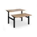 Dams Elev8 Luxe sit-stand back-to-back desks with 1200mm width, featuring adjustable height and modern workspace design.