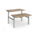 Dams Elev8 Luxe sit-stand back-to-back desks with 1200mm width, featuring smooth height adjustment and modern design.