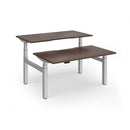 Dams Elev8 Luxe sit-stand back-to-back desk in white with 1400mm width, showcasing adjustable height and modern office design.