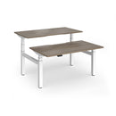 Dams Elev8 Luxe sit-stand back-to-back desks with 1400mm width, featuring white surfaces and adjustable height for ergonomic workspace.