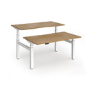 Dams Elev8 Luxe sit-stand back-to-back desk in white, 1400mm width, showing adjustable height and sleek modern design