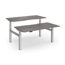 Dams Elev8 Luxe sit-stand back-to-back desks with 1600mm width, featuring adjustable height and modern workspace design.