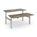 Dams Elev8 Luxe sit-stand back-to-back desks with 1600mm length, featuring adjustable height and modern office design.