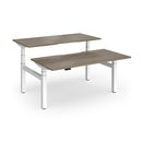 Dams Elev8 Luxe sit-stand back-to-back desks in white, 1600mm wide, with adjustable height and modern design.