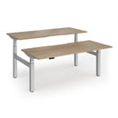 Dams Elev8 Luxe sit-stand back-to-back desks in 1800mm with sleek wood finish and modern design for flexible workspace setup.
