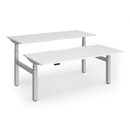Dams Elev8 Luxe sit-stand back-to-back desks in white with 1800mm length, featuring adjustable height and sleek modern design.