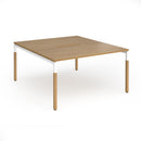 Dams Connex Plus wooden goal-post back-to-back desk in oak with sleek, modern design and natural wood finish.