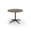 Dams Loft Circular Dining Table in Nebraska Oak with sturdy wooden surface and modern design for contemporary dining spaces.