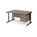 Dams Maestro 25 Wave Desk with Nebraska Oak finish, cantilever legs, and two fixed drawers on a clean office background.