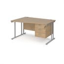 Dams Maestro 25 Wave Desk with Kendal Oak finish, cantilever leg, and fixed 3-drawer pedestal for modern office workspace.