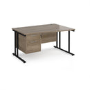 Dams Maestro 25 Wave Desk with Nebraska Oak finish, cantilever legs, and fixed 2-drawer pedestal, showcasing modern office workspace.