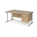 Dams Maestro 25 Wave Desk with Kendal Oak finish, cantilever leg, and fixed 2-drawer pedestal shown from side view.
