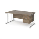 Dams Maestro 25 Wave Desk with Nebraska Oak finish, featuring cantilever leg and fixed 2-drawer pedestal.