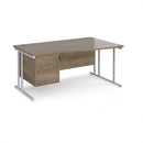 Dams Maestro 25 Wave desk with Nebraska oak finish, cantilever leg and fixed 2-drawer pedestal in a modern office setting.