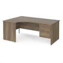 Dams Maestro 25 ergonomic desk with Nebraska Oak finish, panel end leg design, and fixed two-drawer pedestal.
