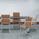 Nautilus Designs Aura contemporary medium back bonded leather visitor chair with chrome frame in a modern office setting