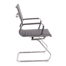 Aura contemporary medium-back bonded leather visitor chair with chrome frame by Nautilus Designs, shown from side view.