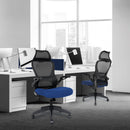 Nautilus Designs Canis high back mesh office chair with molded foam seat, folding arms, and optional headrest in a lifestyle setting