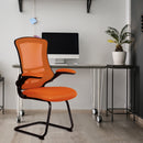 Nautilus Designs Luna Designer medium back mesh cantilever chair with folding arms, shown in a modern office setting.