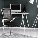 Nautilus Designs Luna Medium Back Mesh Cantilever Chair with white shell and folding arms, shown in a modern office setting.