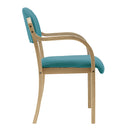 Nautilus Designs Tahara fabric beech framed stackable side armchair with upholstered padded seat and backrest, shown from side view.