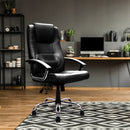 Nautilus Designs Westminster high back leather executive chair with integral headrest and chrome base, shown in a professional office setting.