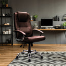 Nautilus Designs Westminster high-back leather executive chair with integral headrest and chrome base, shown in a modern office setting.