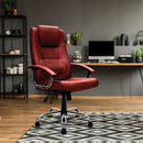 Nautilus Designs Westminster high back leather executive chair with integrated headrest and chrome base, shown in a professional office setting.