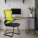 Nautilus Designs Luna Medium Back Two Tone Mesh Cantilever Chair with folding arms, showcasing modern office seating in a lifestyle setting.