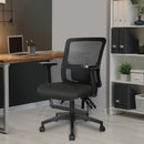 Nautilus Designs Barri medium back mesh task chair with fabric seat in black, shown in a modern office setting.