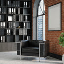 Black Belmont contemporary reception chair with leather face, stainless steel frame, and integrated leg supports in a modern lounge setting.