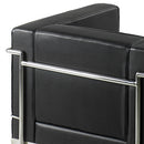 Black Belmont contemporary reception chair with leather face, stainless steel frame, and integrated leg supports by Nautilus Designs.