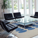 Black Valencia contemporary oversized leather-faced reception sofa with classic button design by Nautilus Designs.