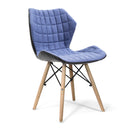 Nautilus Designs Amelia lightweight fabric chair with solid beech legs and contemporary panel stitching, perfect for modern interiors.