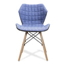 Nautilus Designs Amelia lightweight fabric chair with solid beech legs and contemporary panel stitching, shown from the front.