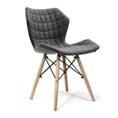Nautilus Designs Amelia lightweight fabric chair with solid beech legs and contemporary panel stitching in gray fabric.