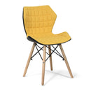 Nautilus Designs Amelia lightweight fabric chair with solid beech legs and modern panel stitching, showcasing stylish interior seating.