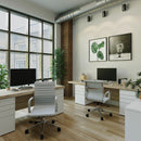 Nautilus Designs Aura contemporary medium-back fabric executive chair with chrome base, shown in a modern office setting.