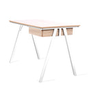 Nautilus Designs Tyrol compact workstation with oak top and white legs, featuring a suspended underdesk drawer and modern office style.