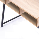 Nautilus Designs Vienna Compact Two-Tier Workstation with oak top, black frame, upper storage shelf, and built-in drawers.