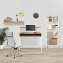 Nautilus Designs Vienna compact two-tier workstation with walnut top, white frame, upper storage shelf, and stylish feature design.