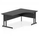 Black Impulse Crescent Desk with cantilever legs by Dynamic, showcasing a modern office desk with sleek black finish.