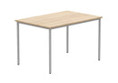 Canadian Oak Core Multi-Purpose Table by TC with sturdy wooden top and metal legs, suitable for work or dining spaces.