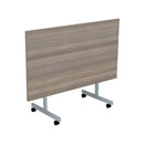 Grey oak rectangular tilting table from One Eighty by TC, showing smooth surface and adjustable tilting mechanism.