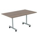 Front view of the TC One Eighty Rectangular Tilting Table in Grey Oak with a sleek modern design.